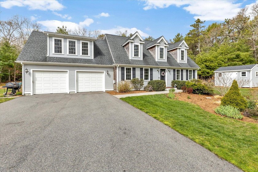 Tucked at the end of a quiet cul-de-sac, this welcoming - Beach Home for sale in Teaticket, Massachusetts on Beachhouse.com