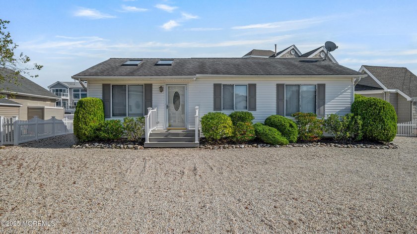 Enjoy waterfront living in this charming 3-bedroom, 1-bath home - Beach Home for sale in Beach Haven West, New Jersey on Beachhouse.com
