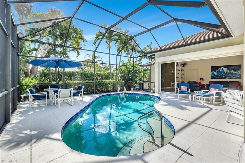 Framed by mature landscaping and southern light, this inviting - Beach Home for sale in Bonita Springs, Florida on Beachhouse.com