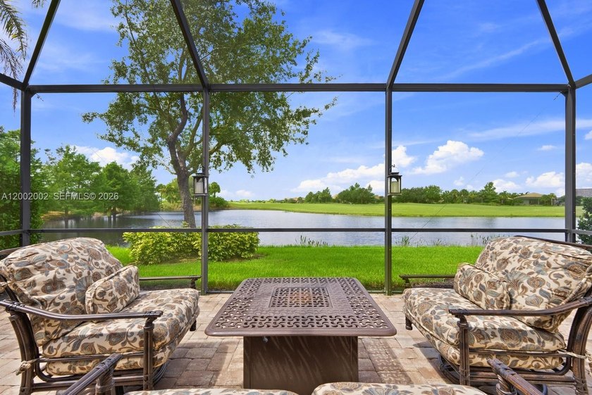 Perfectly positioned on the WATER and 12th FAIRWAY of Panther - Beach Home for sale in Ave Maria, Florida on Beachhouse.com