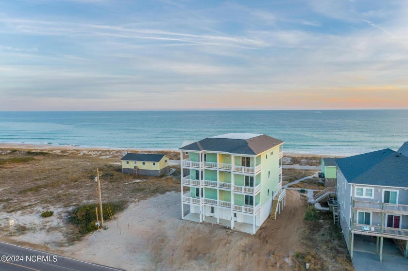 Indulge in the epitome of coastal luxury with this extraordinary - Beach Townhome/Townhouse for sale in North Topsail Beach, North Carolina on Beachhouse.com