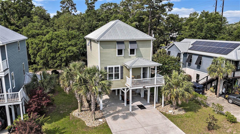 Inlet Living at Its Best! Welcome to this charming raised beach - Beach Home for sale in Murrells Inlet, South Carolina on Beachhouse.com