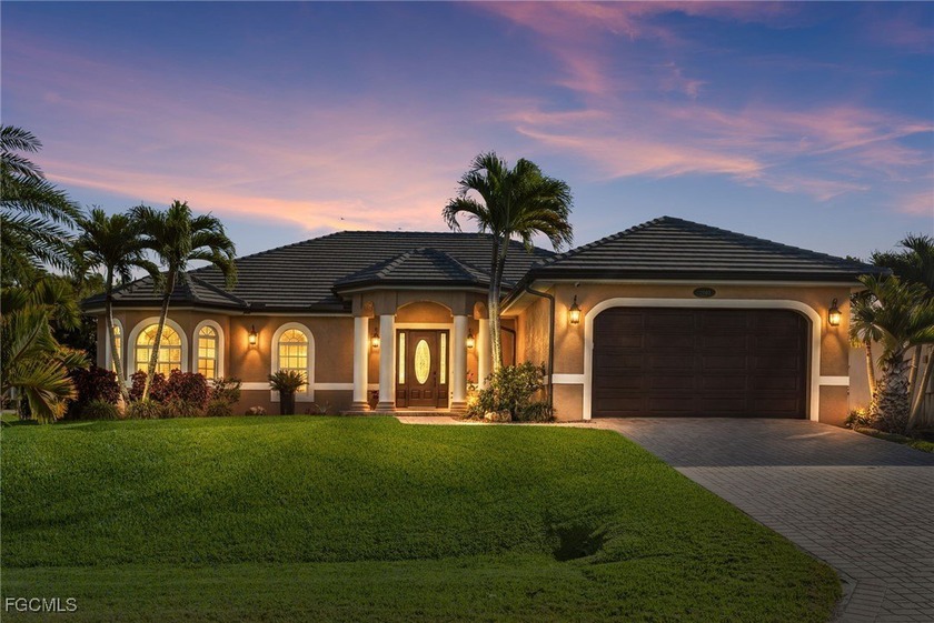 Welcome to this home built by Woodland Custom Homes. This - Beach Home for sale in Cape Coral, Florida on Beachhouse.com