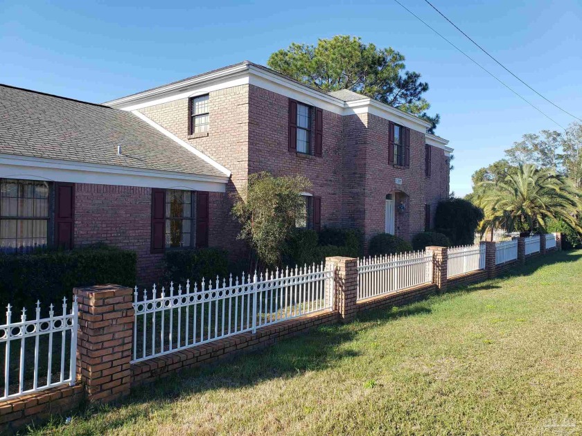 Large brick home with beautiful views of the Bayou! This home - Beach Home for sale in Pensacola, Florida on Beachhouse.com