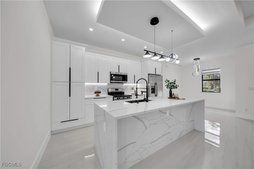 Stunning 4-bedroom, 3-bath home designed for both comfortable - Beach Home for sale in Lehigh Acres, Florida on Beachhouse.com