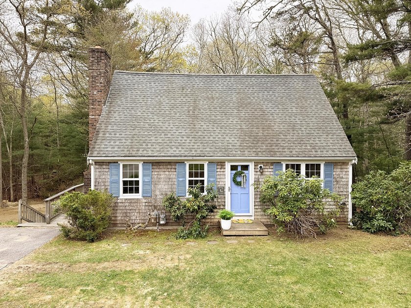 Tucked away on a private, wooded lot in sought-after North - Beach Home for sale in North Falmouth, Massachusetts on Beachhouse.com