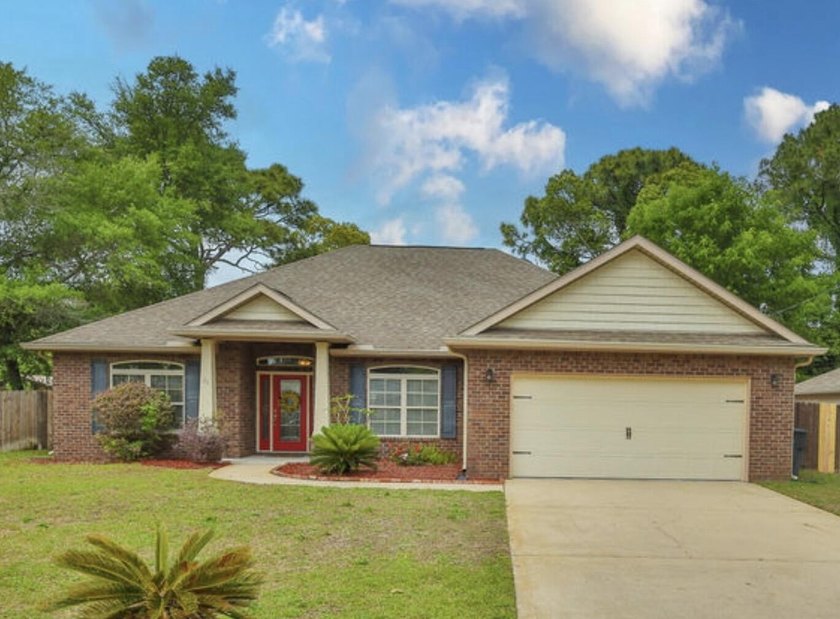 Welcome to a beautifully maintained all-brick home offering - Beach Home for sale in Fort Walton Beach, Florida on Beachhouse.com