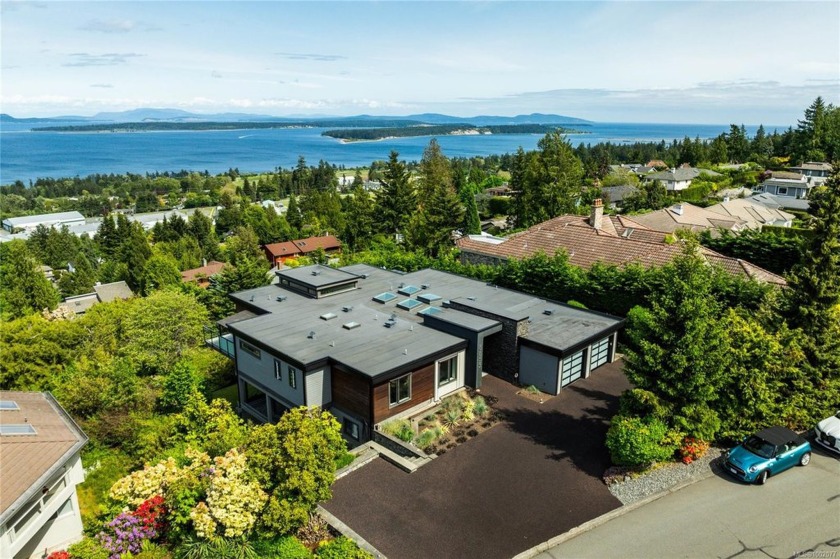 Perched in the prestigious Dean Park neighborhood, this - Beach Home for sale in North Saanich,  on Beachhouse.com