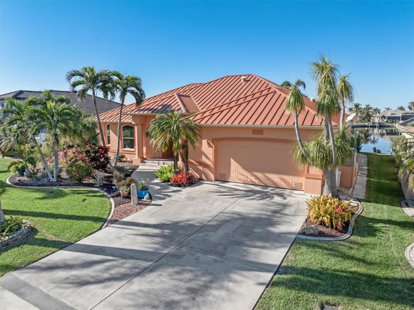 Discover the allure of this stunning WATERFRONT custom home - Beach Home for sale in Punta Gorda, Florida on Beachhouse.com