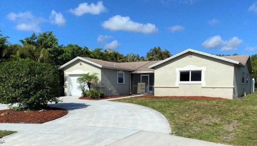 A rare find! This single-family home is located in Sandal Foot - Beach Home for sale in Boca Raton, Florida on Beachhouse.com