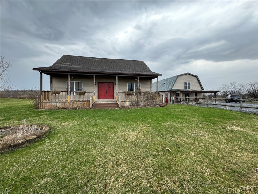 Move right in to this beautiful home and horse barn located on a - Beach Acreage for sale in Watertown, New York on Beachhouse.com