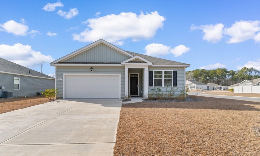 Welcome home to easy, one-level living in the peaceful Tallwood - Beach Home for sale in Longs, South Carolina on Beachhouse.com