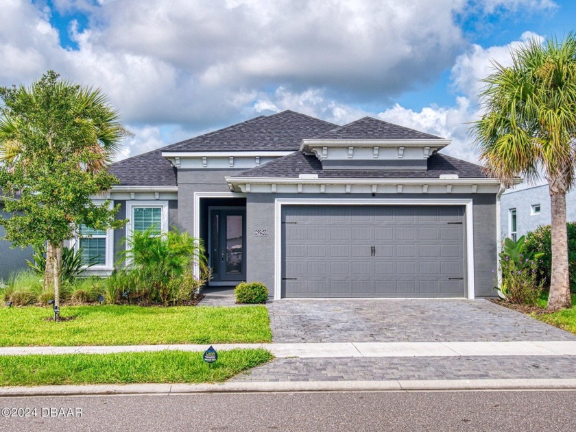 This exceptional home offers luxury and comfort with recent - Beach Home for sale in Port Orange, Florida on Beachhouse.com