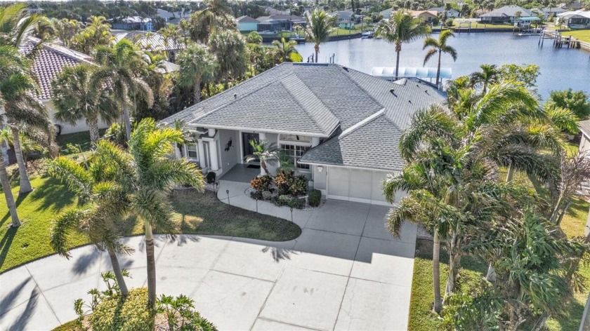 STUNNING RARE WATERFRONT GULF ACCESS HOME WITH A WIDE BASIN - Beach Home for sale in Port Charlotte, Florida on Beachhouse.com