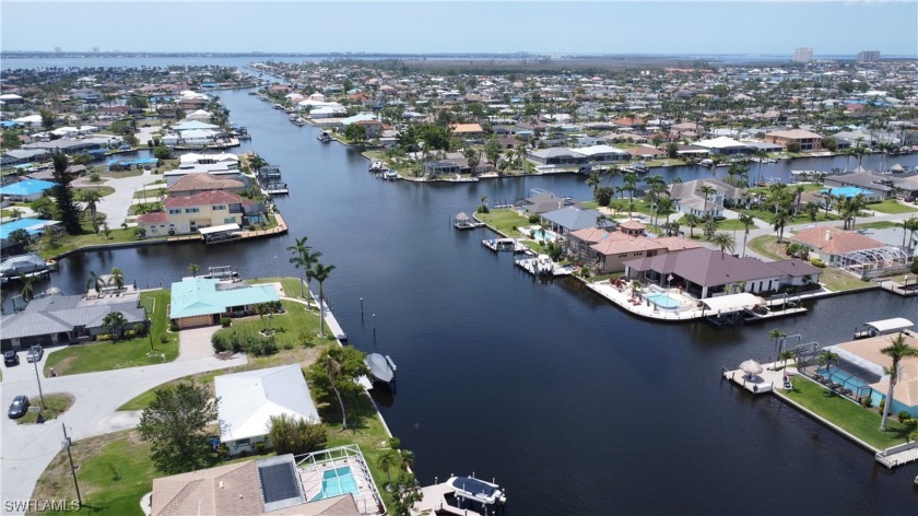 WELCOME TO THE BOATER PARADISE WITHOUT BRIDGES! Located on the - Beach Home for sale in Cape Coral, Florida on Beachhouse.com