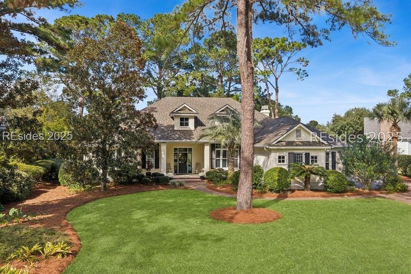 Enjoy panoramic golf and lagoon views overlooking the par 3, 2nd - Beach Home for sale in Bluffton, South Carolina on Beachhouse.com