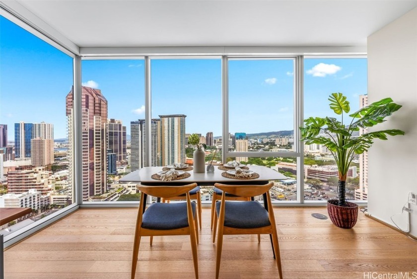 HUGE PRICE REDUCTION TO $1,050,000!  Stunning CORNER END luxury - Beach Condo for sale in Honolulu, Hawaii on Beachhouse.com