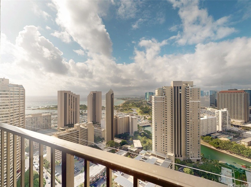 This upper-floor 2-bedroom, 1-bath residence at Chateau Wakiki - Beach Condo for sale in Honolulu, Hawaii on Beachhouse.com