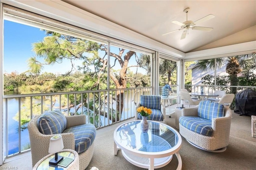 Perched along an idyllic tree-lined street within the Harbor - Beach Condo for sale in Bonita Springs, Florida on Beachhouse.com