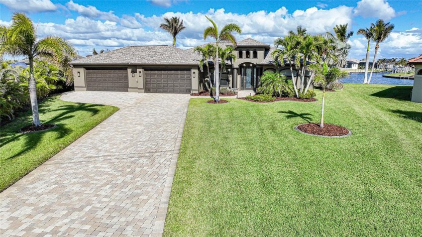 This exceptional waterfront home, meticulously crafted by DM - Beach Home for sale in Port Charlotte, Florida on Beachhouse.com