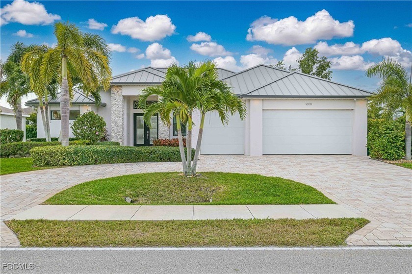 Experience an exquisite blend of indoor and outdoor living in - Beach Home for sale in Cape Coral, Florida on Beachhouse.com