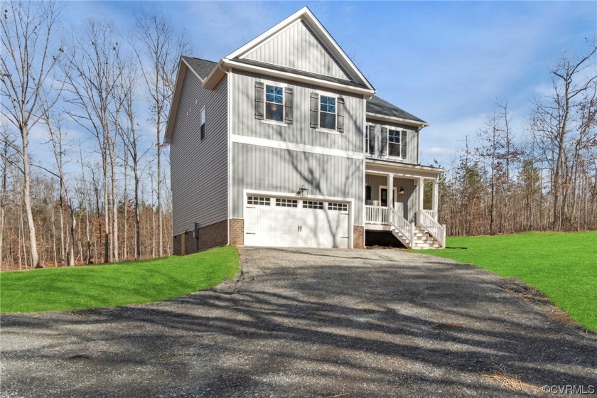 Nestled within the scenic beauty of the Garland Lake community - Beach Home for sale in Warsaw, Virginia on Beachhouse.com