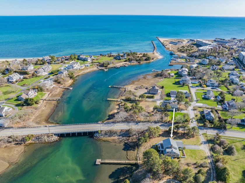 Waterfront home perched above the Herring River, this property - Beach Home for sale in West Harwich, Massachusetts on Beachhouse.com