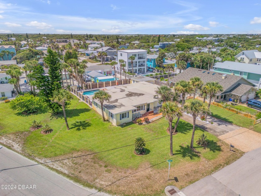 Location, location, location.  This 4-bedroom, 2-bathroom, 3 car - Beach Home for sale in New Smyrna Beach, Florida on Beachhouse.com