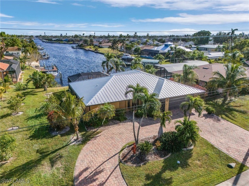 Enter into this light-filled, furnished 3-bedroom, 2-bathroom - Beach Home for sale in Cape Coral, Florida on Beachhouse.com