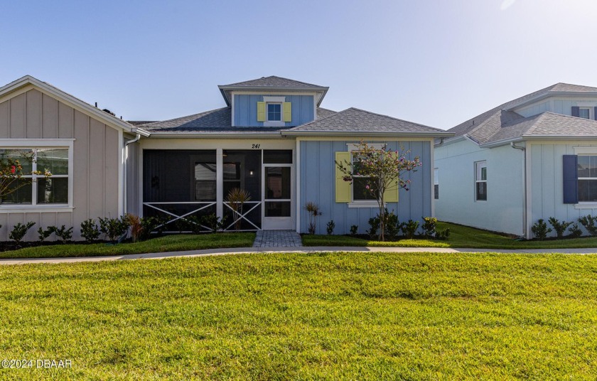 A tropical oasis awaits you in this Camellia Cottage with a - Beach Home for sale in Daytona Beach, Florida on Beachhouse.com