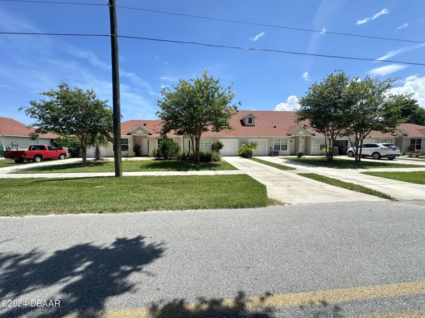 DOG LOVERS AND GOLFERS WILL LOVE THIS LOCATION!!  WATERFRONT - Beach Townhome/Townhouse for sale in Daytona Beach, Florida on Beachhouse.com