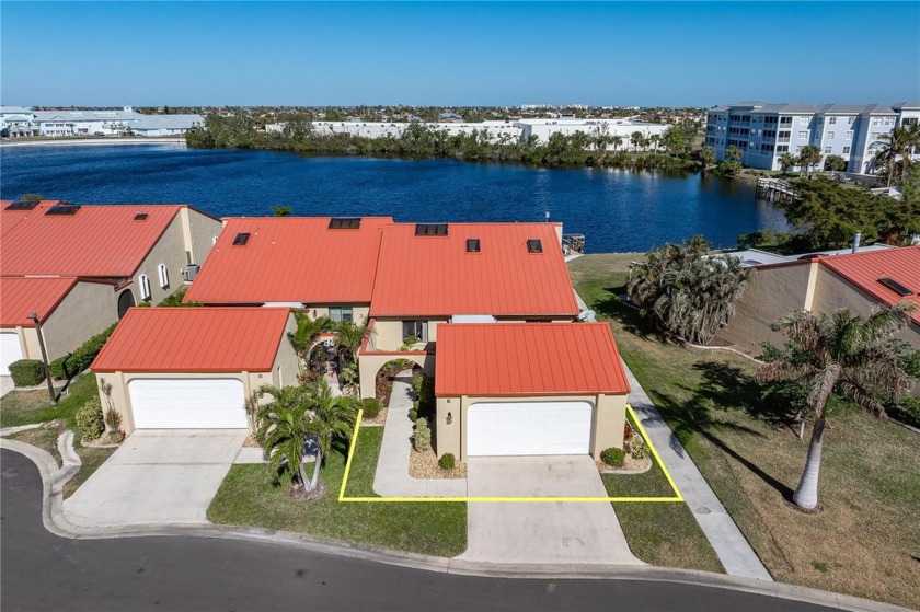 LAKEFRONT VILLA W/**NEW METAL ROOF** AT PARADISE GARDEN VILLAS - Beach Home for sale in Punta Gorda, Florida on Beachhouse.com