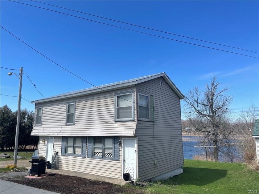 ATTENTION FISHERMEN UND SUMMER RECREATION SEEKERS! THIS HOME ON - Beach Home for sale in Pulaski, New York on Beachhouse.com