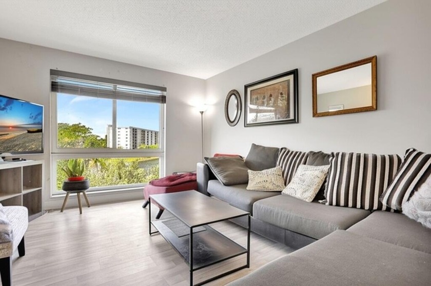 Penthouse-Style Living with Gorgeous Lake Views! This 2/2 corner - Beach Condo for sale in Pompano Beach, Florida on Beachhouse.com