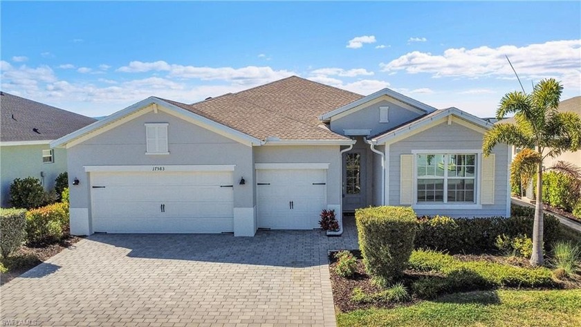 NEED A 3-CAR GARAGE? This contemporary lake view home has 4 - Beach Home for sale in Punta Gorda, Florida on Beachhouse.com
