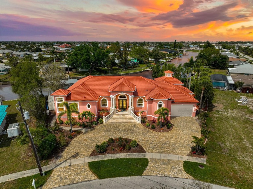 Envision waking up to breathtaking water views every morning - Beach Home for sale in Port Charlotte, Florida on Beachhouse.com