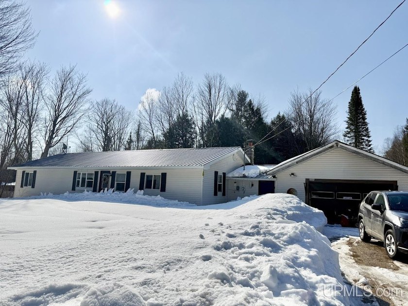 Country setting on 1 acre just minutes from local stores - Beach Home for sale in Rapid River, Michigan on Beachhouse.com