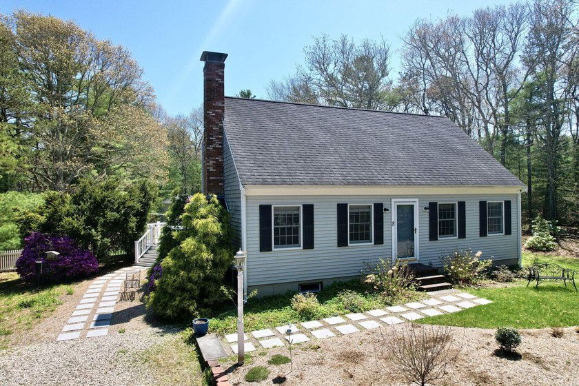 This beautifully updated home features a modern kitchen with - Beach Home for sale in East Falmouth, Massachusetts on Beachhouse.com