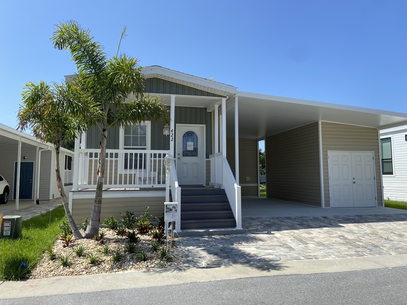 Located in a resort style, active, 55+, Age qualified/Non flood - Beach Home for sale in Tarpon Springs, Florida on Beachhouse.com