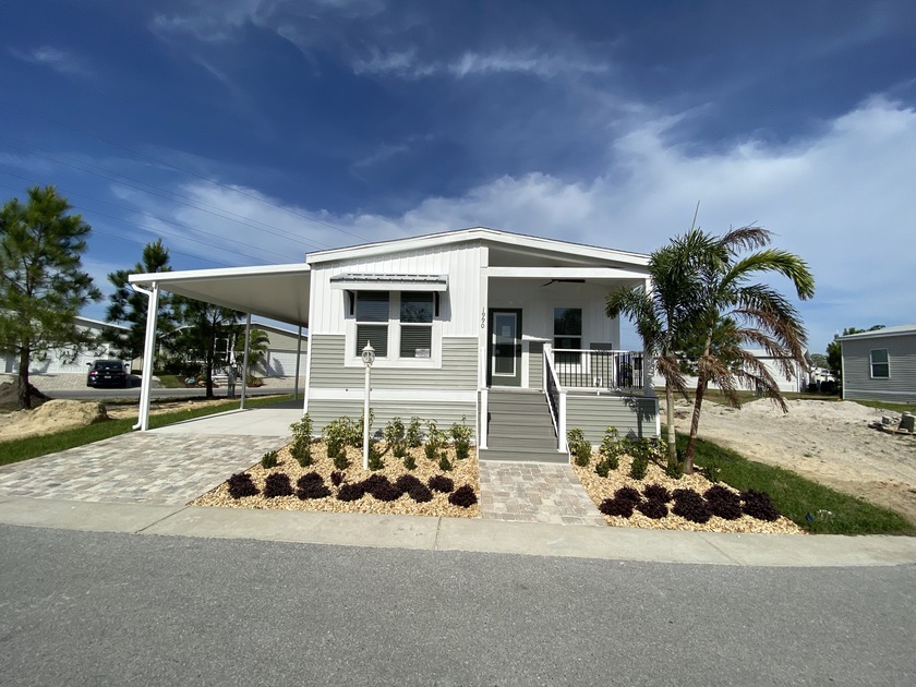 Located in a resort style, active, Non flood zone, pet friendly - Beach Home for sale in Tarpon Springs, Florida on Beachhouse.com