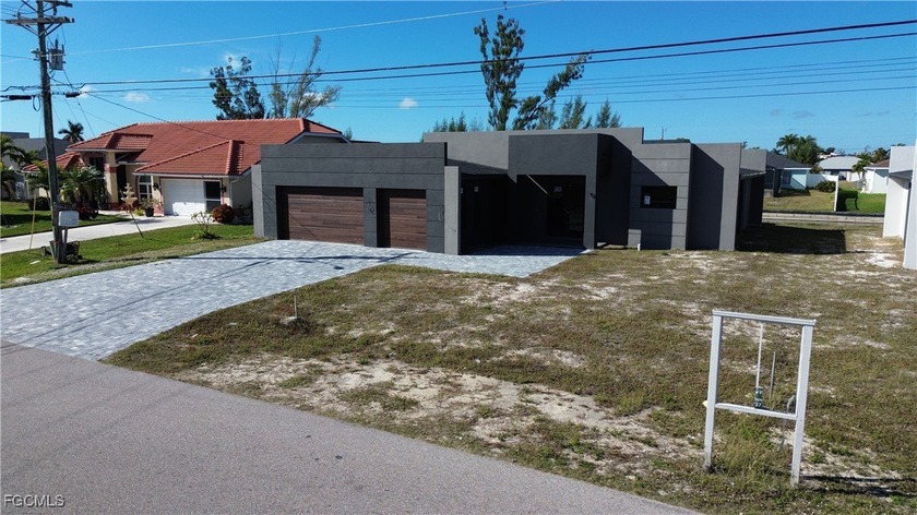 Be the first to call this beautiful new construction home yours! - Beach Home for sale in Cape Coral, Florida on Beachhouse.com