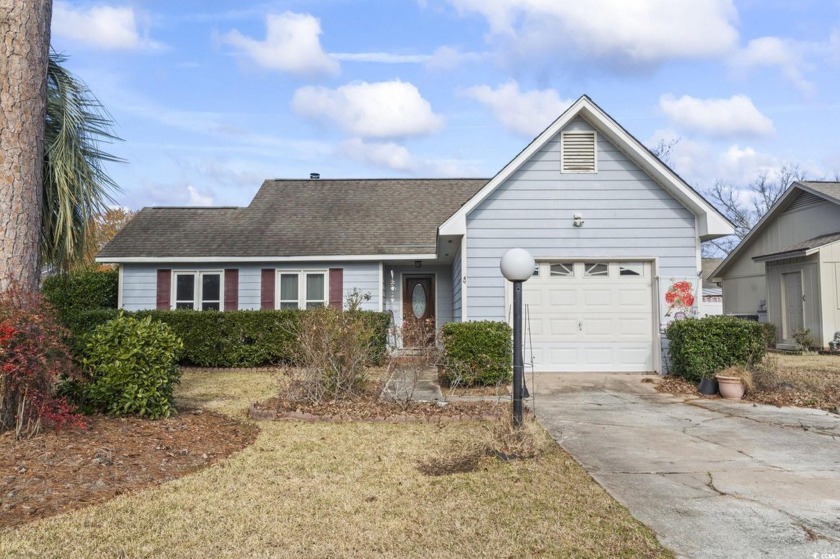 This charming 3-bedroom, 2-bathroom home offers a spacious - Beach Home for sale in Myrtle Beach, South Carolina on Beachhouse.com