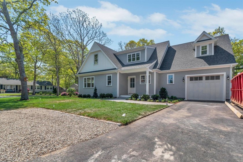 Located in the private neighborhood of Great Harbors, this - Beach Home for sale in East Falmouth, Massachusetts on Beachhouse.com