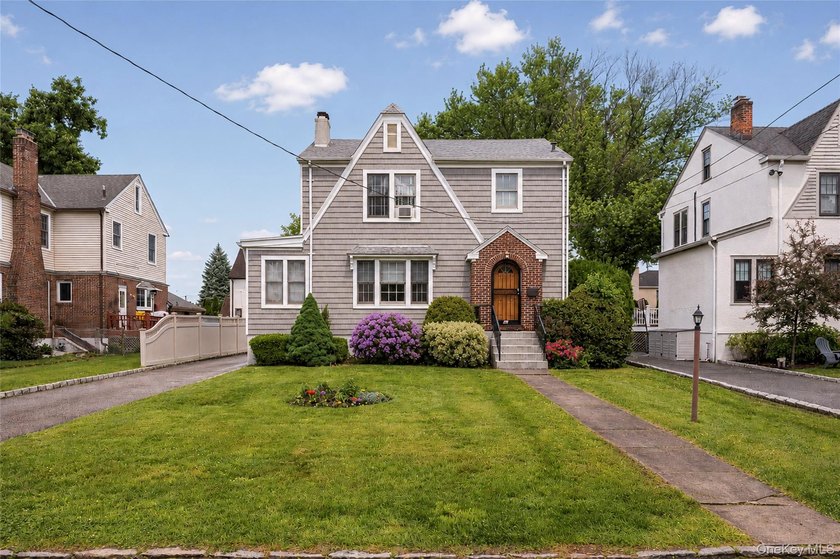 BRONXVILLE MANOR welcomes you. Experience this Modern Tudor with - Beach Home for sale in Eastchester, New York on Beachhouse.com
