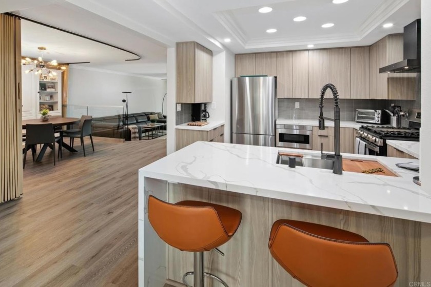 A rare ground-floor, west-facing corner unit in Kingston Court - Beach Condo for sale in Coronado, California on Beachhouse.com
