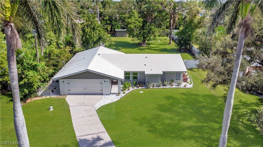 Discover unparalleled luxury in this fully custom-remodeled home - Beach Home for sale in North Fort Myers, Florida on Beachhouse.com