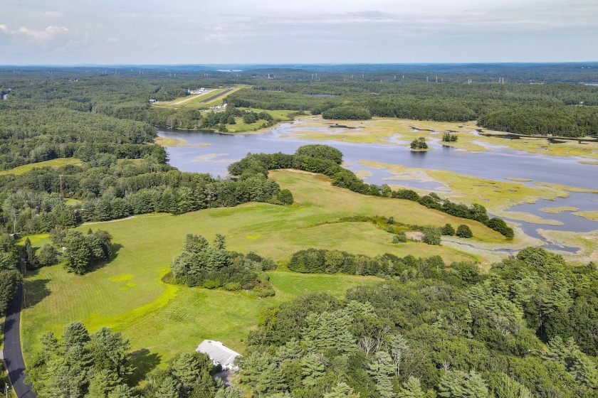 Welcome to 323 Montsweag Road! Nestled on a sprawling 28-acre - Beach Home for sale in Woolwich, Maine on Beachhouse.com