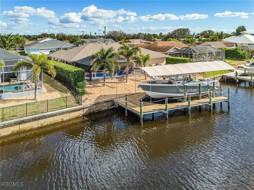 NEW PRICE-$649,000. HIGH & DRY waterfront living on a DIRECT - Beach Home for sale in Cape Coral, Florida on Beachhouse.com