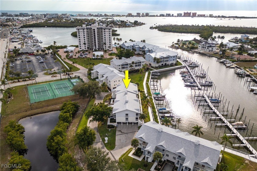 Come by Boat, Come by Car. This luxurious Yacht Harbor location - Beach Condo for sale in Fort Myers Beach, Florida on Beachhouse.com