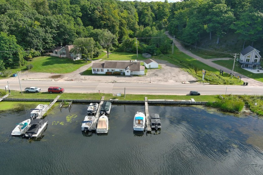 Opportunity awaits! This commercially zoned 1.73 acre parcel - Beach Commercial for sale in Pentwater, Michigan on Beachhouse.com